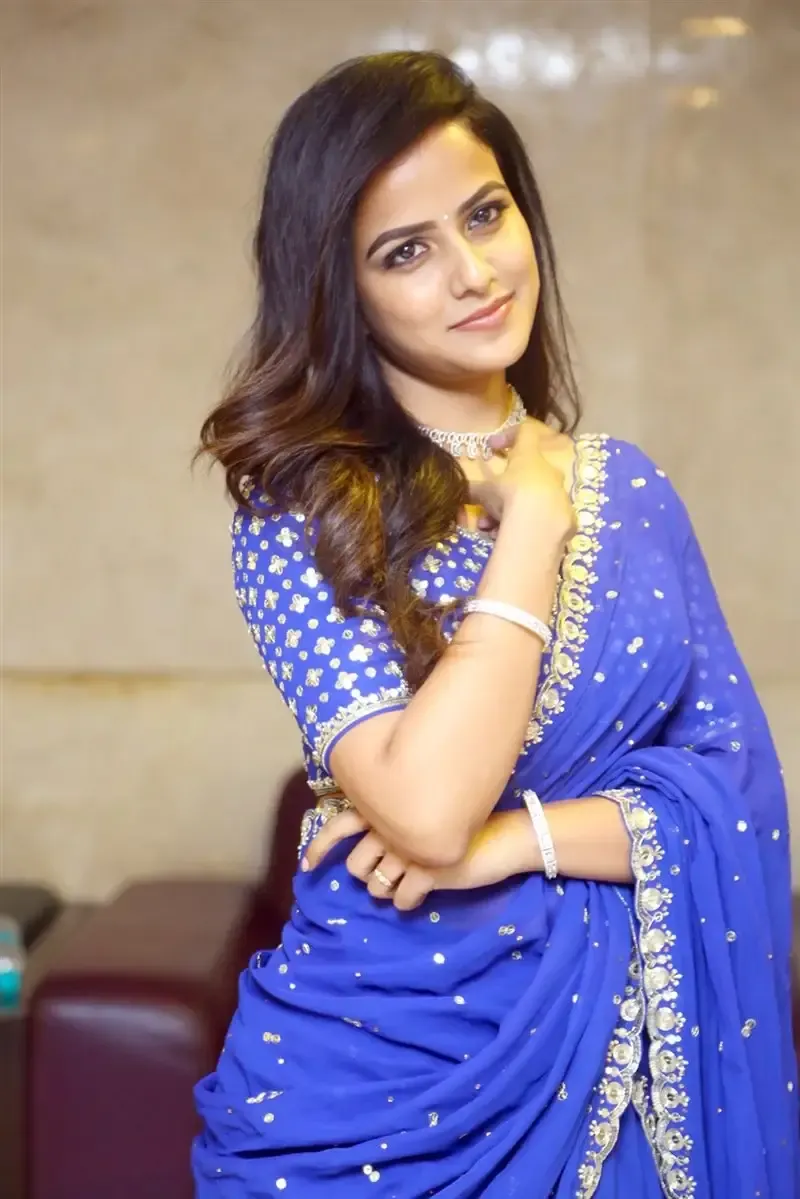 ACTRESS VAISHNAVI CHAITANYA IN BLUE SAREE AT BABY MOVIE PRE RELEASE EVENT 6